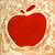cuadros modernos "Manzana roja sobre fondo marrón"