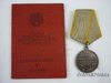 Combat service medal with document (WWII)