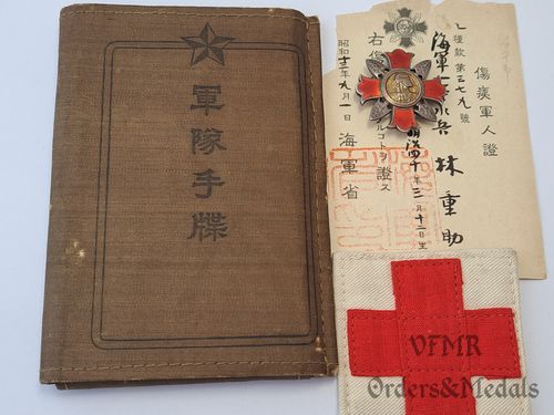 Wounded badge with award document and military card